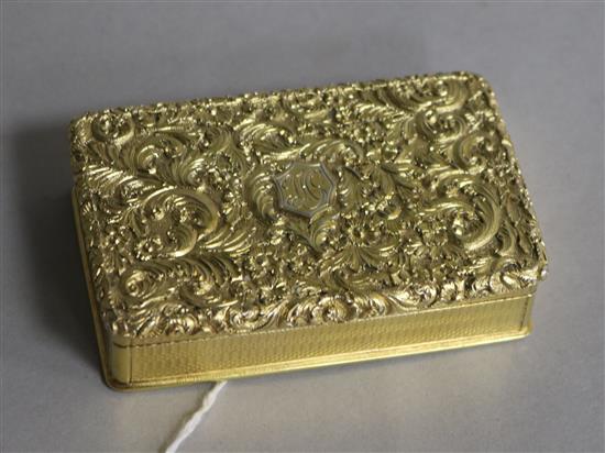 A George IV silver gilt snuff box, Nathaniel Mills, Birmingham, circa 1825 (date letter rubbed), 78mm.